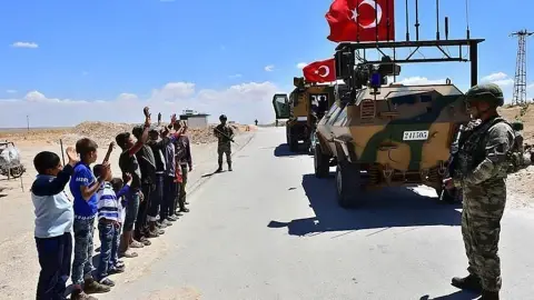 Turkey will shoulder the ’heavy burden’ of ending terror in Syria - Erdogan