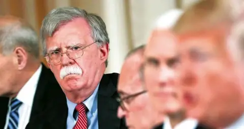 With Bolton’s departure, Trump seeks ways to deflect criticism