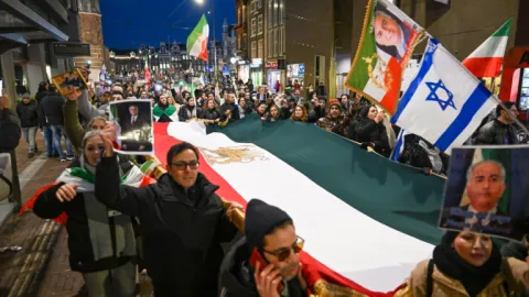 Protesters in Amsterdam hold solidarity rally for demonstrators in Iran